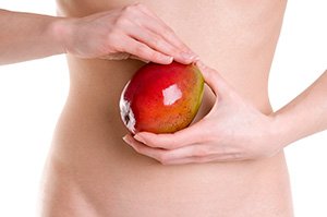 Frau mit Mango Frau mit Mango