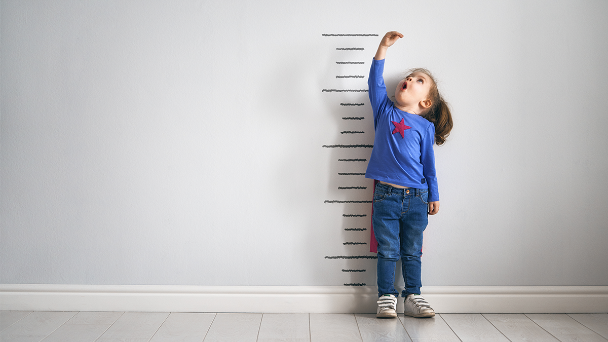 Visuelles Symbol für gesundes Aufwachsen und richtige Dosierung von Vitaminen und Omega 3 für Kinder